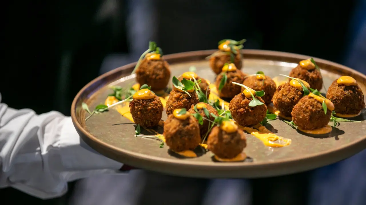 A tray of arancini balls at a corporate event at Crowne Plaza Melbourne.